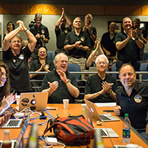 Part of the New Horizons team celebrating the spacecraft's flyby of Pluto.